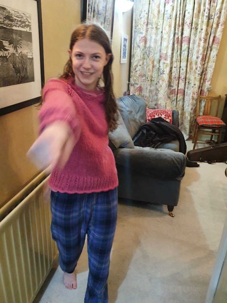 Elizabeth modelling the jumper and walking