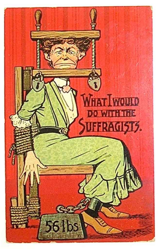 Cartoon of suffragette tied to a chair unable to speak and with a 561pound weight chained to her ankle. Caption reads, "What I would do with the suffragists".