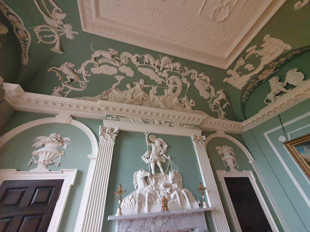 Plaster ceiling and wall in saloon