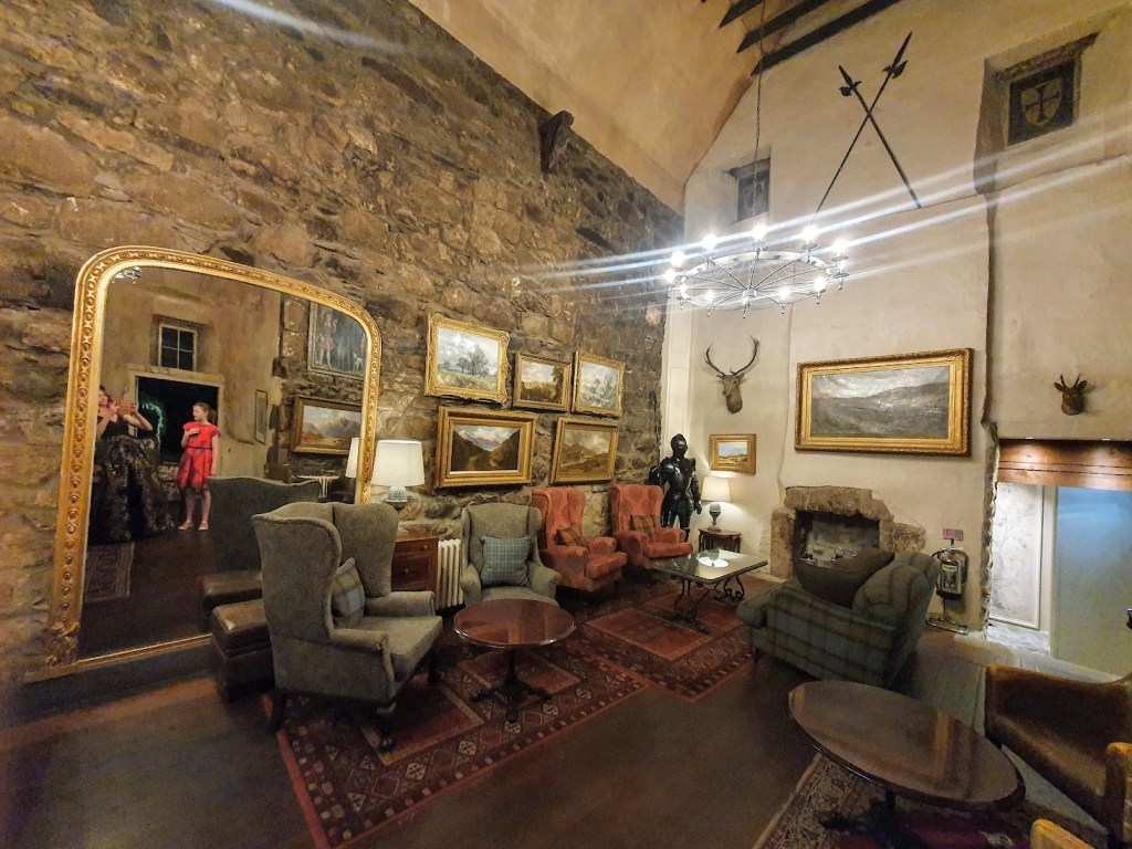 Another view of the hall showing timber beams on the ceiling.