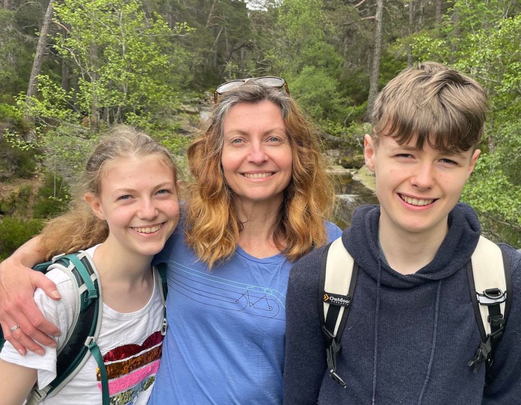 Elizabeth, Rachel, and Daniel with the burn behind us.