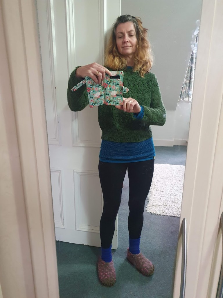 Photo of me wearing my new green jumper