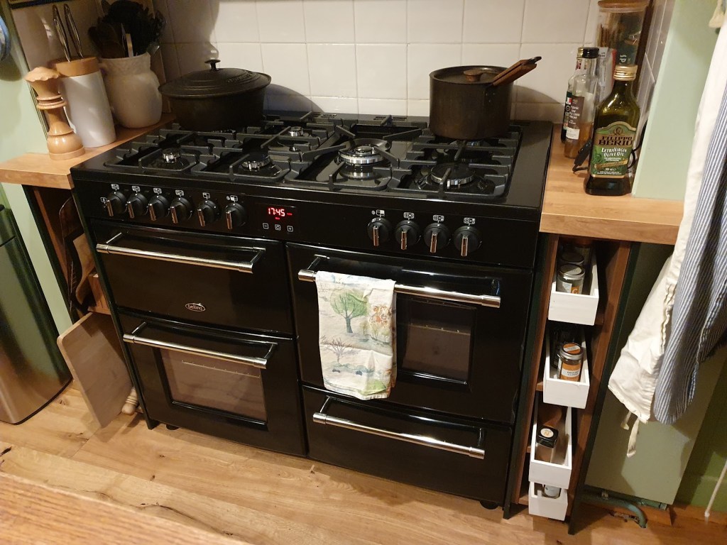 A close-up of the new range which has two ovens, a grill and a storage drawer.