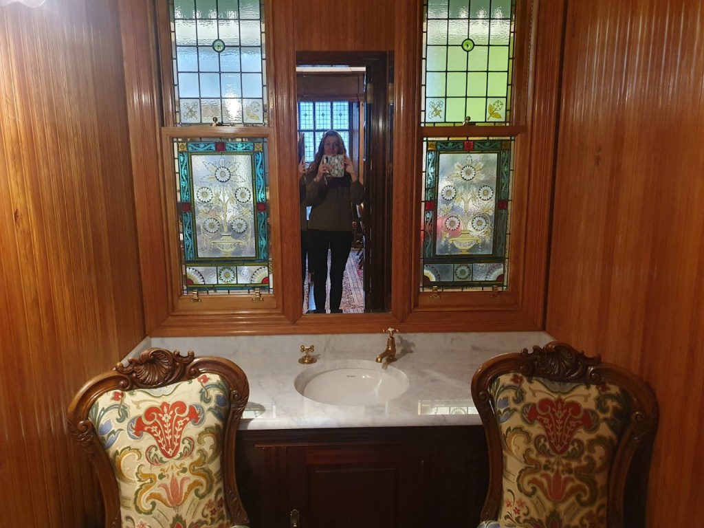 Queen Victoria's basin with stained glass windows behind.