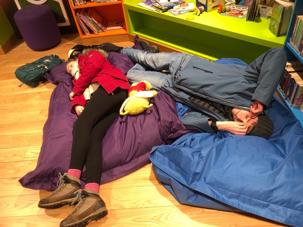 Daniels and Elizabeth collapsed on bean bags.