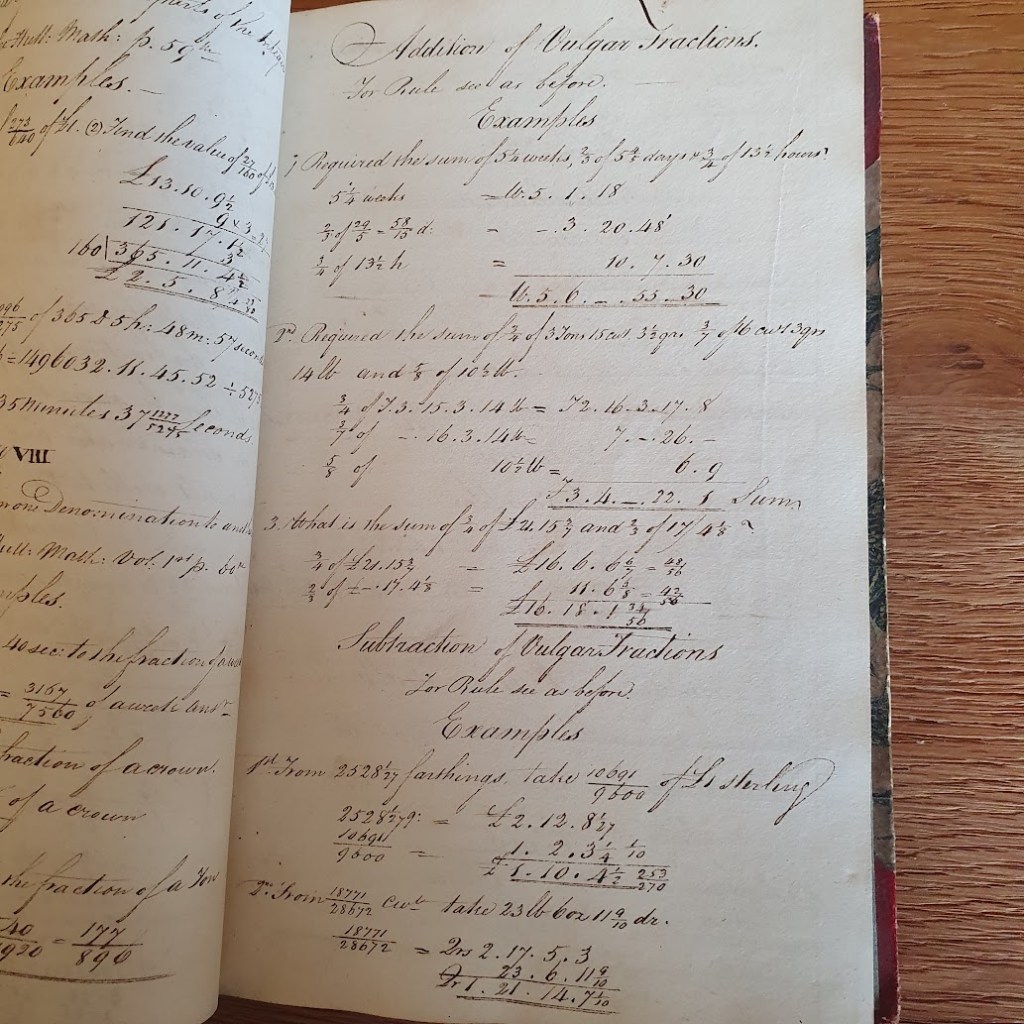 Mathematics written in beautiful cursive writing.