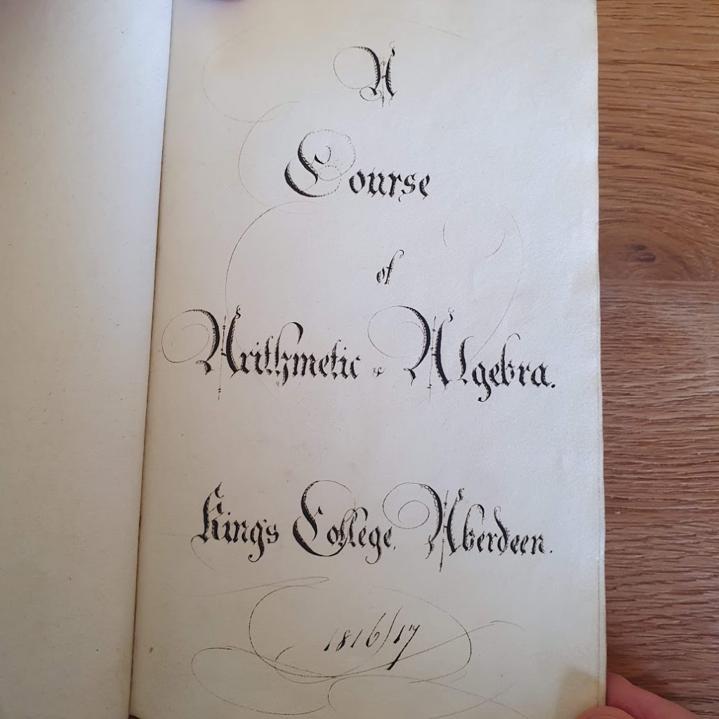 The text reads, "A course of Arithmetic and Algebra. Kings College Aberdeen. 1816/17"