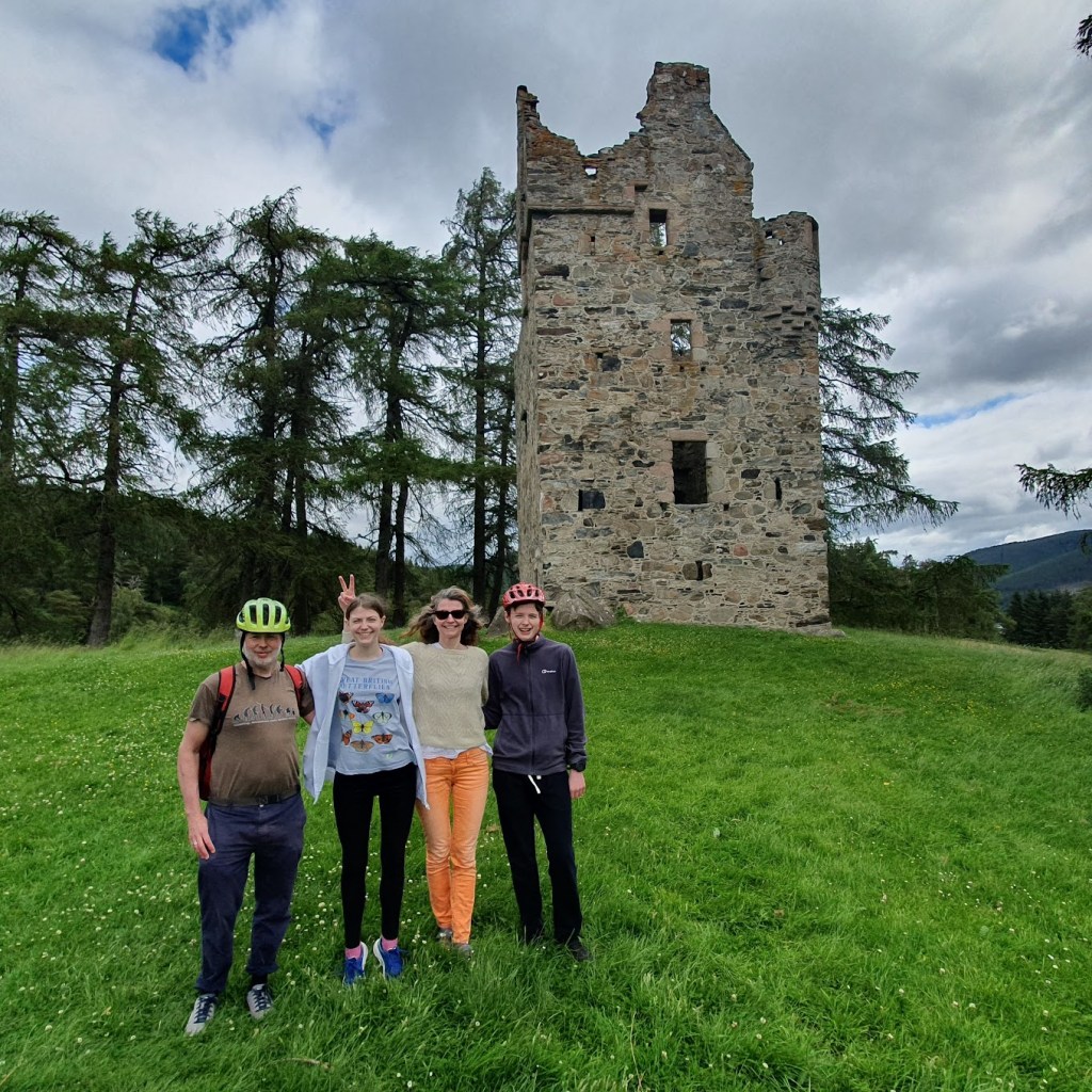 Ben, Elizabeth, Rachel, and Daniel standing in front of the ruin Knock Castle. 