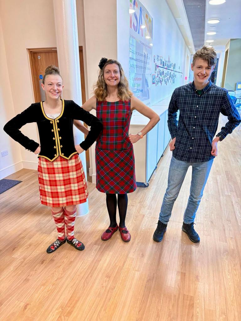 Elizabeth, Rachel, and Daniel in 1st position at ISA to match the old photo from 2019.