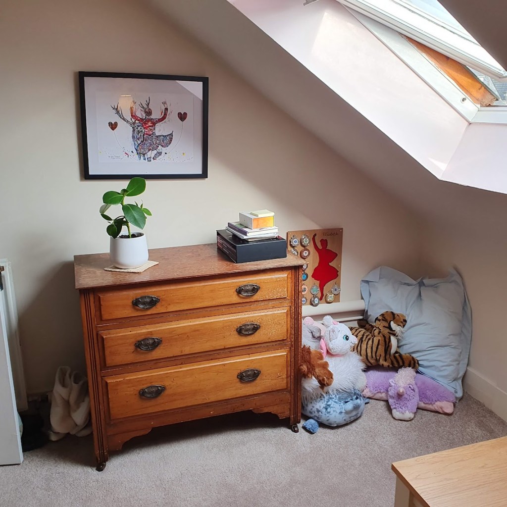 Chest of drawers with highland dance art.