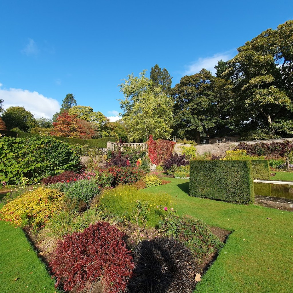 Some of the garden beds at the castle with a clear blue sky as backdrop.