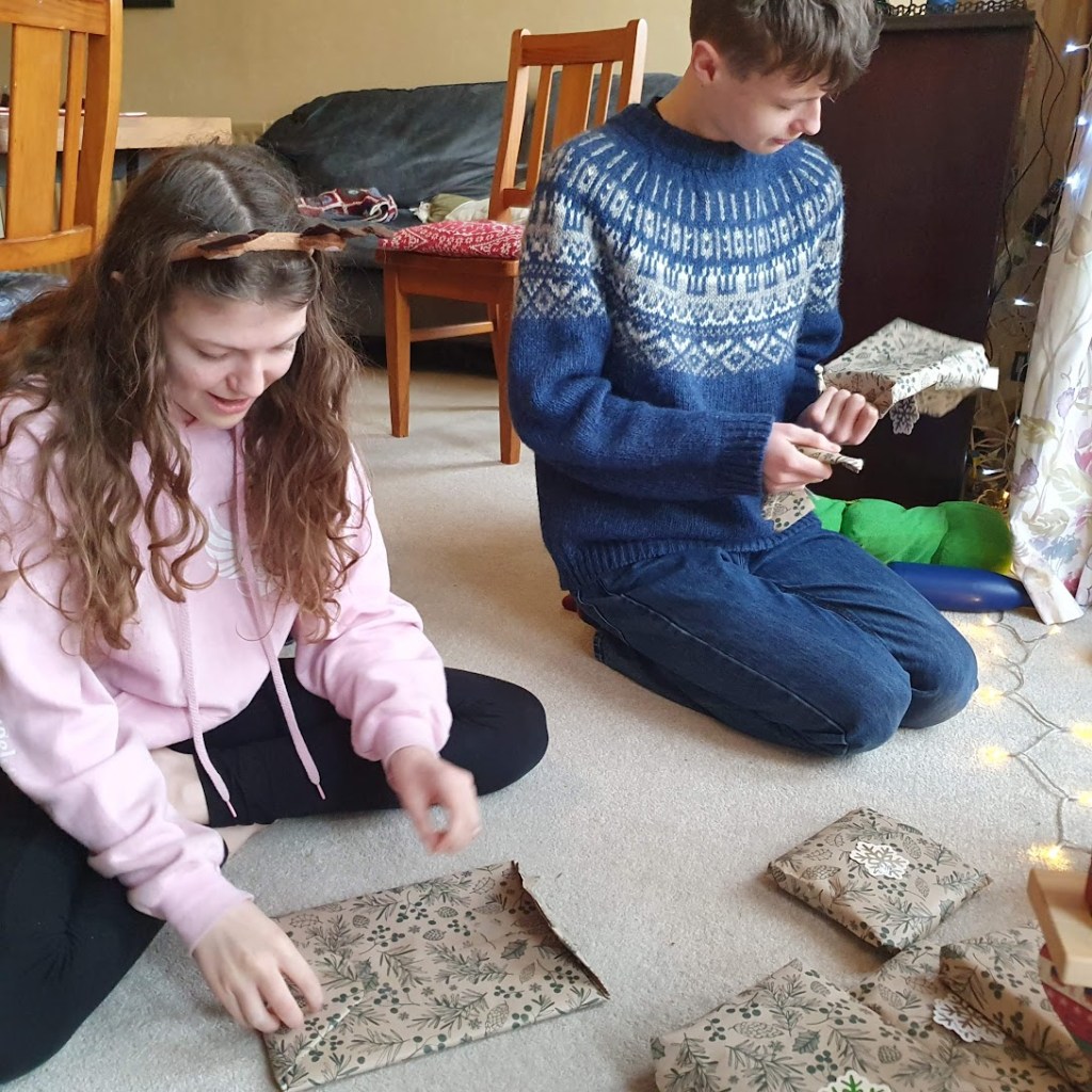 Daniel and Elizabeth opening presents.