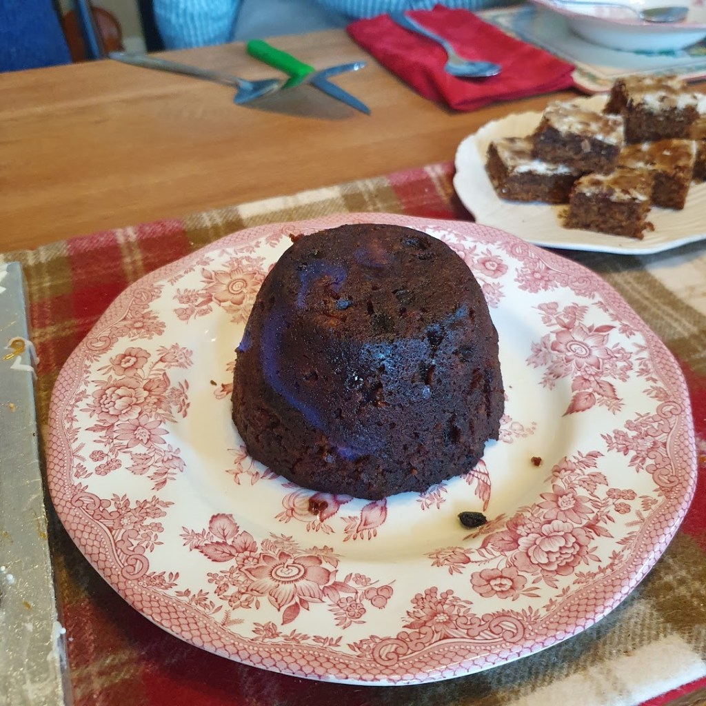 Christmas pudding with blue flames.
