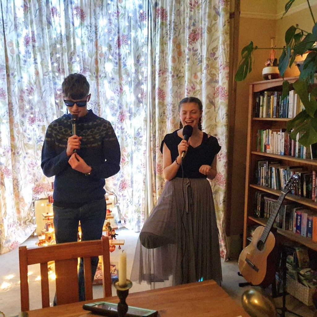 Daniel and Elizabeth singing karaoke.