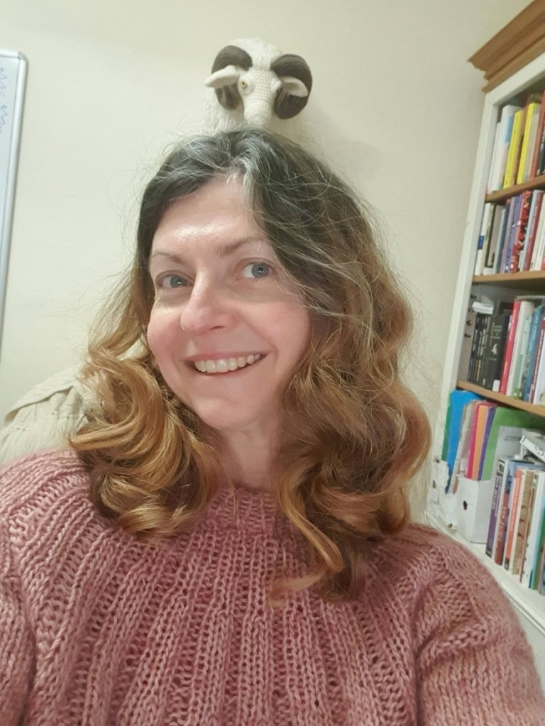 Rachel with curly hair.