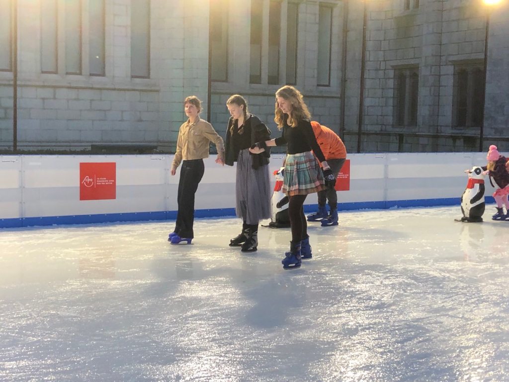 Màiri, Elizabeth and Rachel ice-skating.