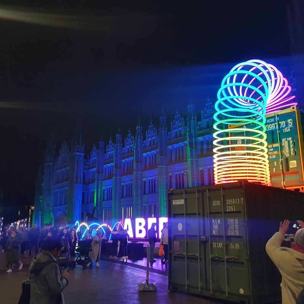 A rainbow slinky in front of Marischal College.