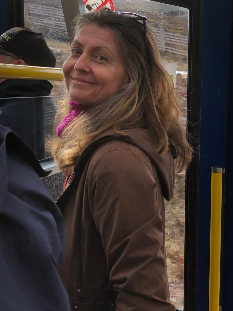Rachel smiling on the upward journey in the carriage. 