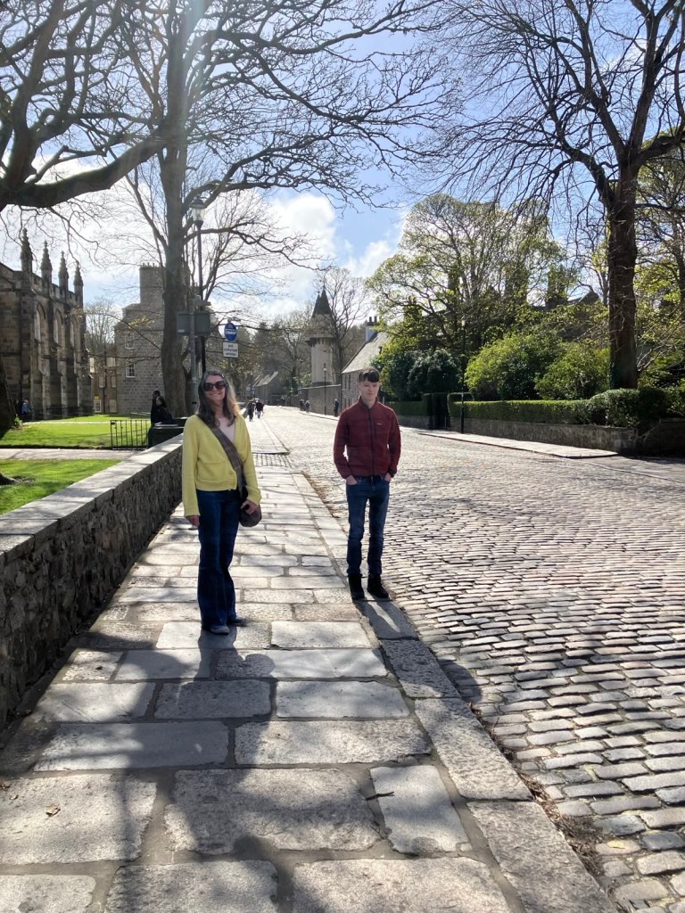 Rachel and Daniel on the cobbled street next to King's College.