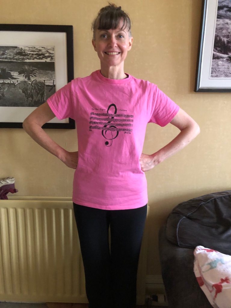 Me standing within my pink tshirt for the finale.