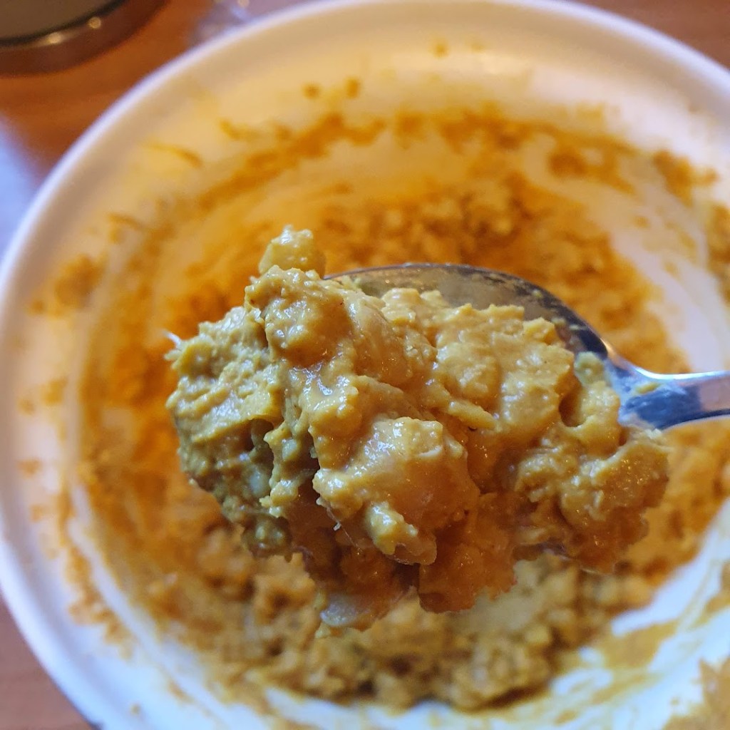 coronation chickpea - a close-up of it on a spoon. 