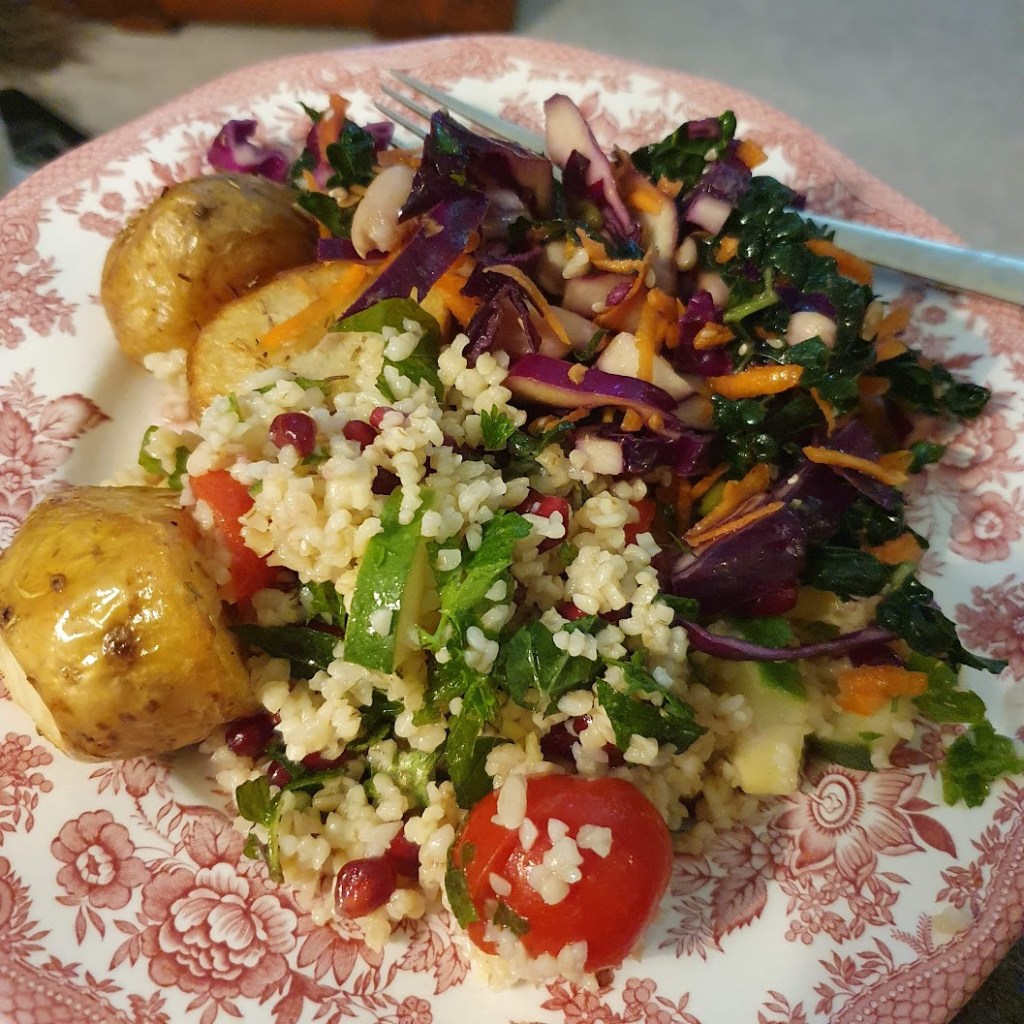 Dinner on Friday night - roast potatoes, tabouleh and rainbow salad
