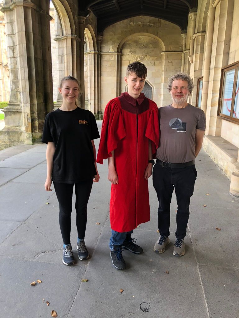 Elizabeth, Daniel and Ben all smiling.