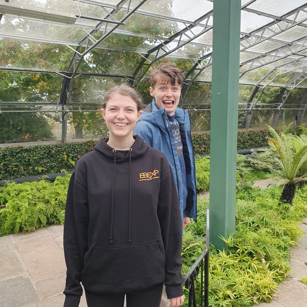 Elizabeth and Daniel in the winter gardens with Daniel pulling a face.