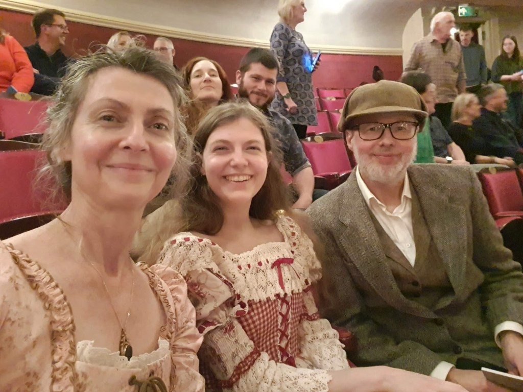 Rachel, Elizabeth and Ben sitting in the theatre