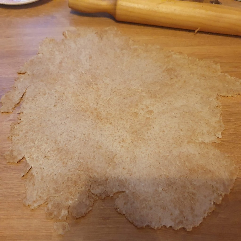 Rolled out pastry with jagged edges