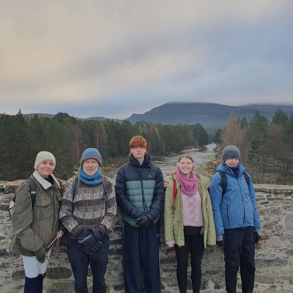 On the old military bridge over the river Dee with the river behind us - Josey, Ben, Oscar, Elizabeth and Daniel