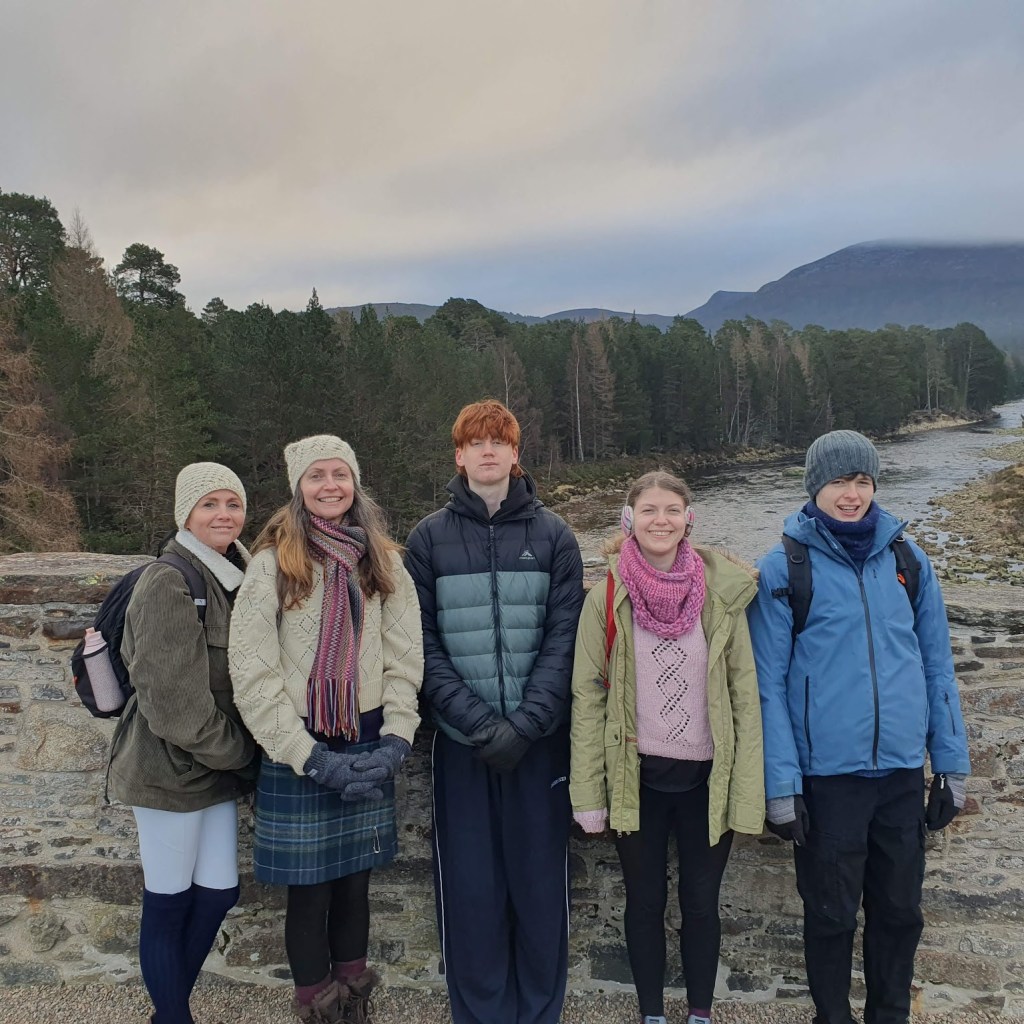 On the old military bridge over the river Dee with the river behind us - Josey, Rachel, Oscar, Elizabeth and Daniel