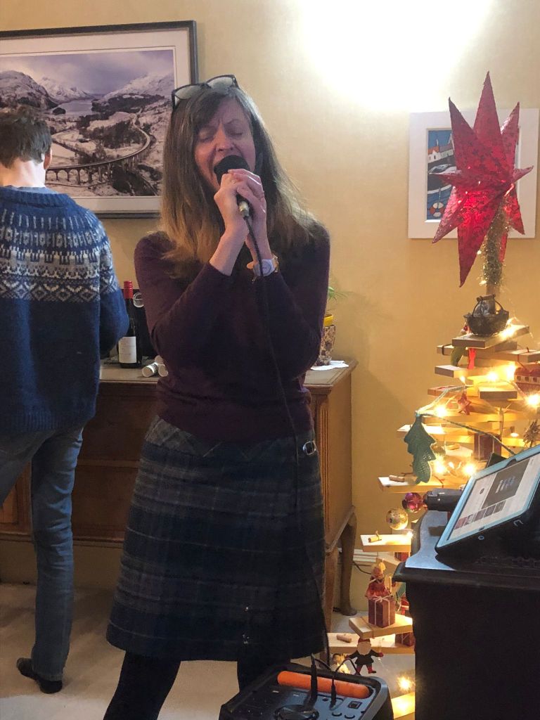 Me looking stupid singing into the microphone.