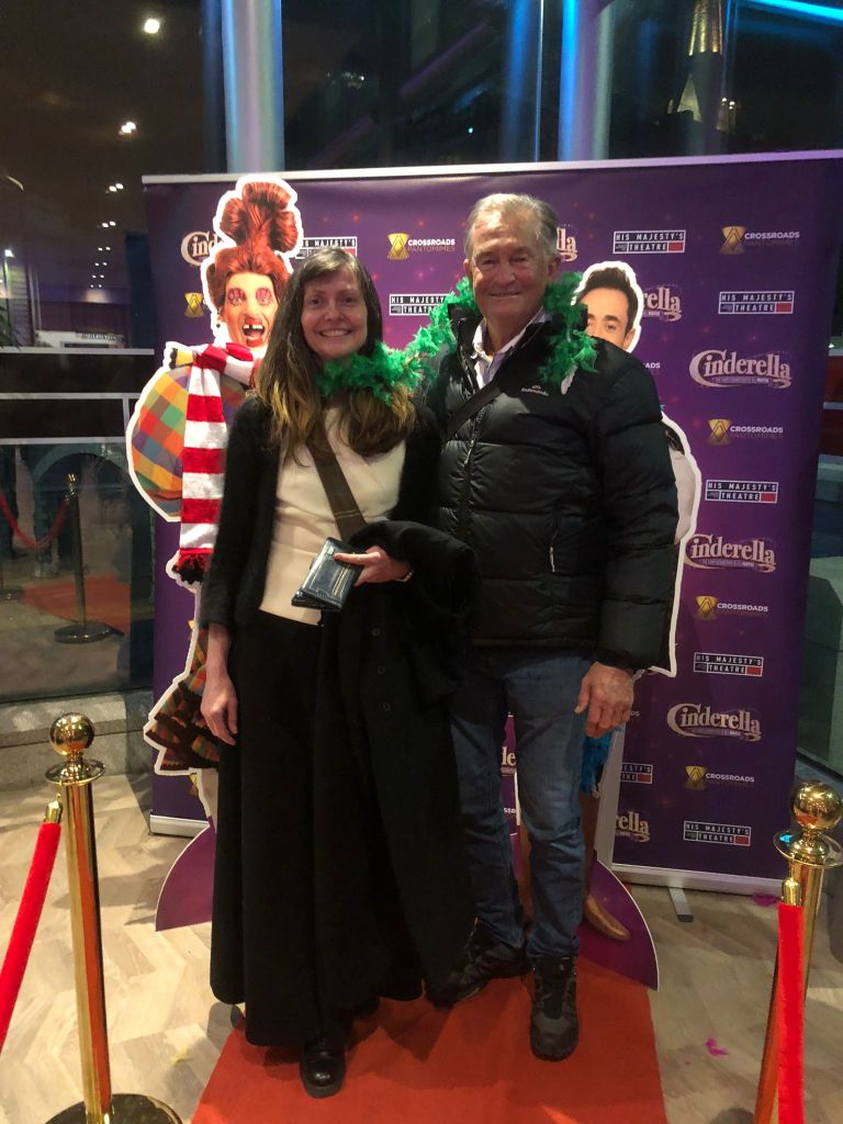 Me and dad with a green scarf in the lobby.