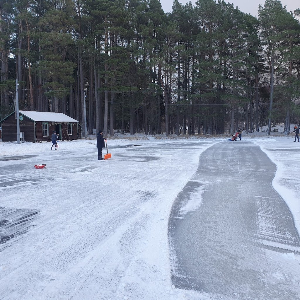 Clearing the curling pond for a game