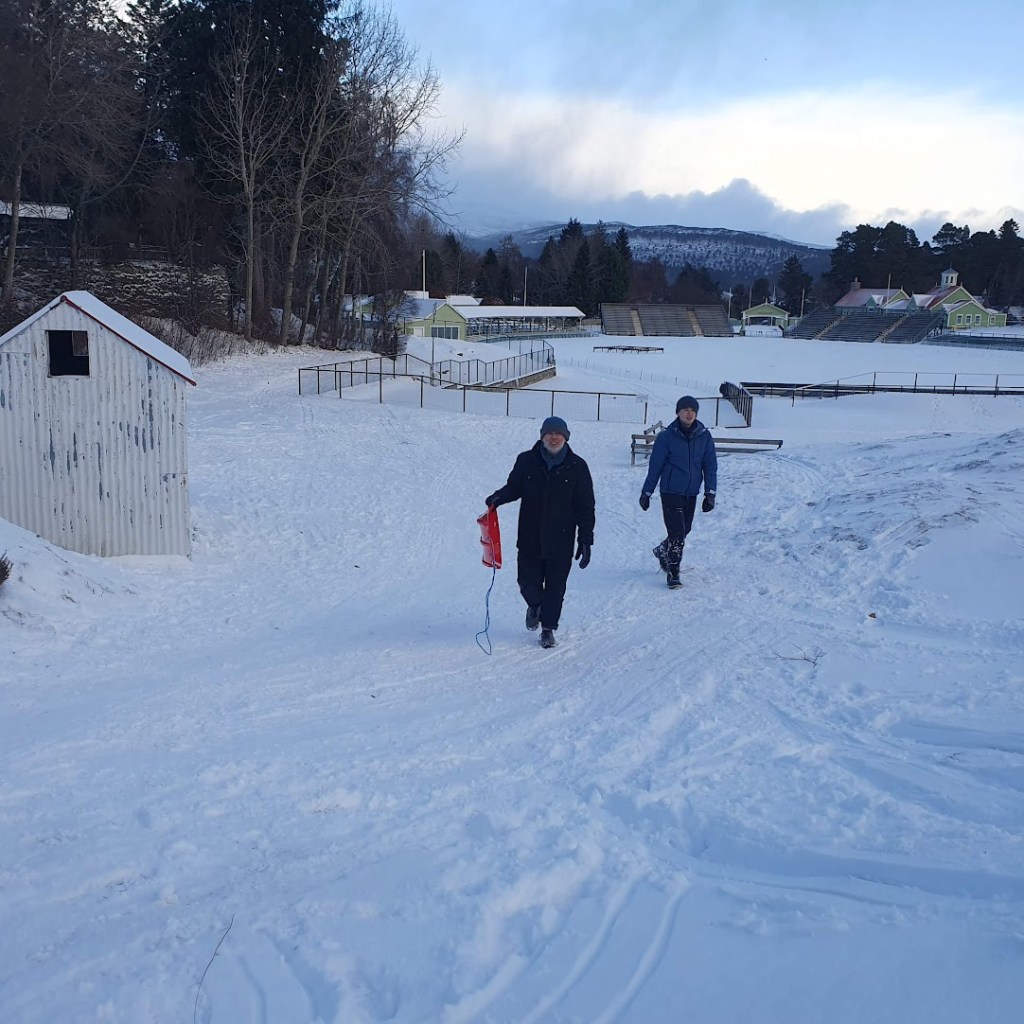 Ben and Daniel walking up the slope