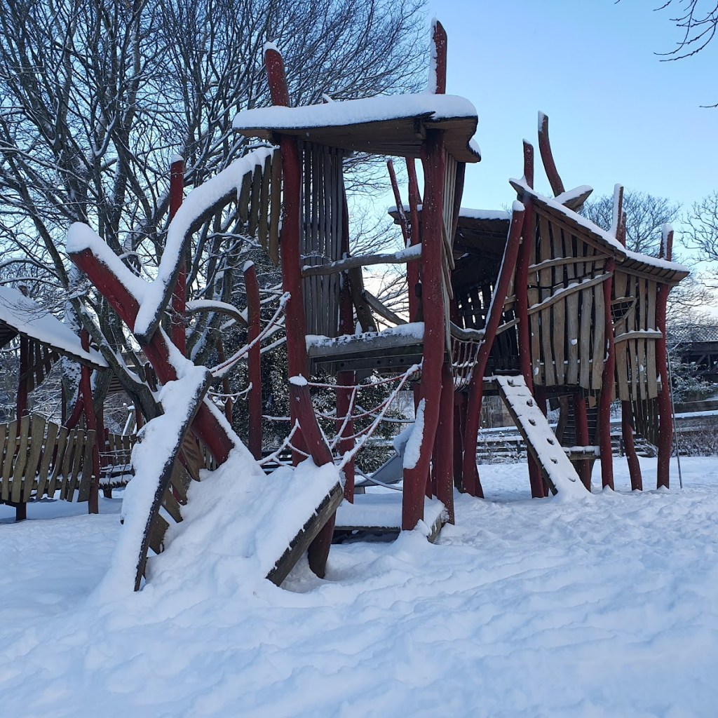 Play equipment covered in snow