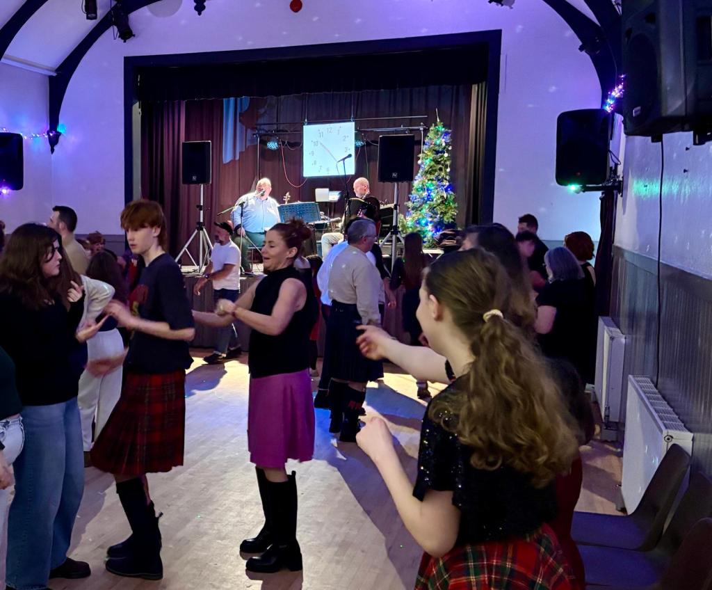 Josey on the dance floor with Maddy and Oscar and Elizabeth