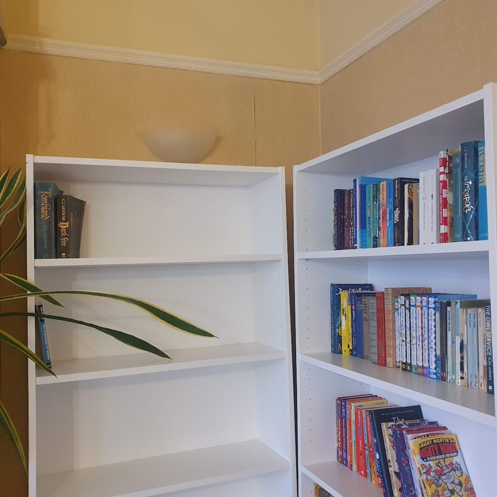 Two billy bookcases in a corner