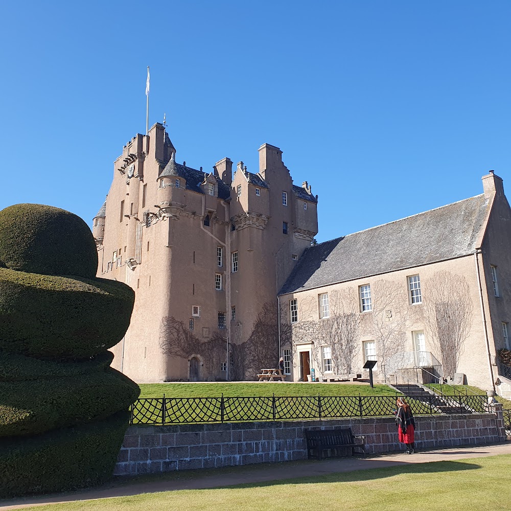 Another shot of Crathes Castle with some topiary hedging on the left.