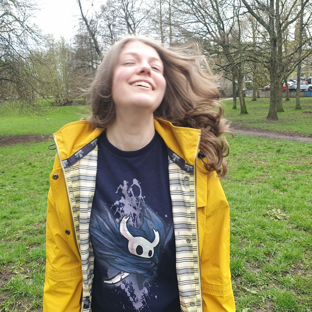 Elizabeth flicking her hair