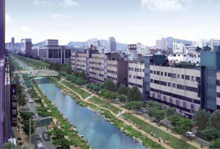 Chronggyecheon Stream restored showing green banks and clean water.