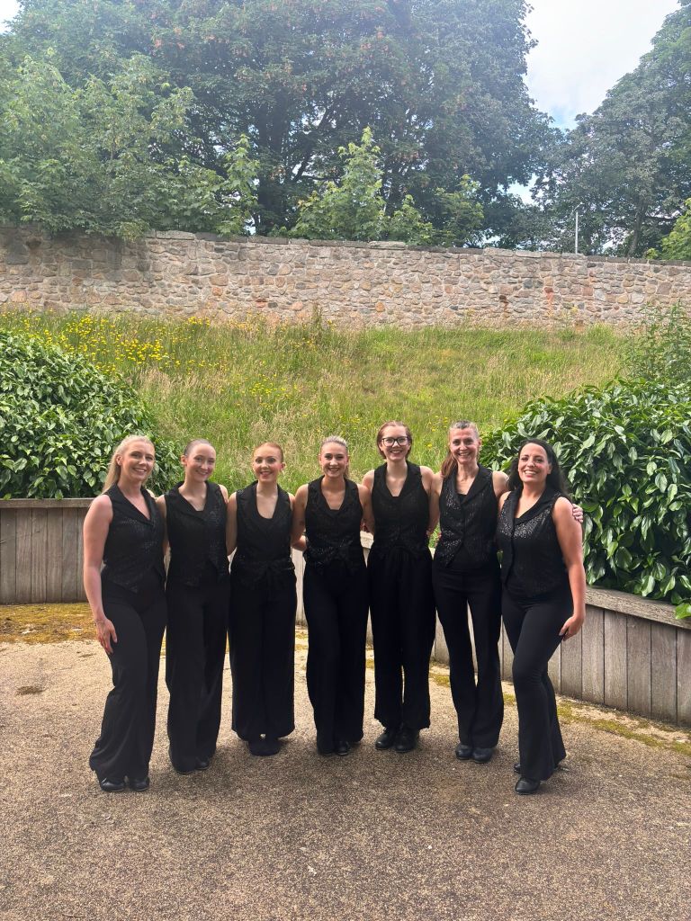 Tappers out the back after the final pose, smiling