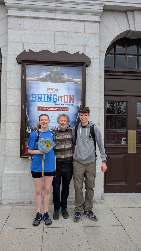Elizabeth, Ben and Daniel outside His Majesty's Theatre