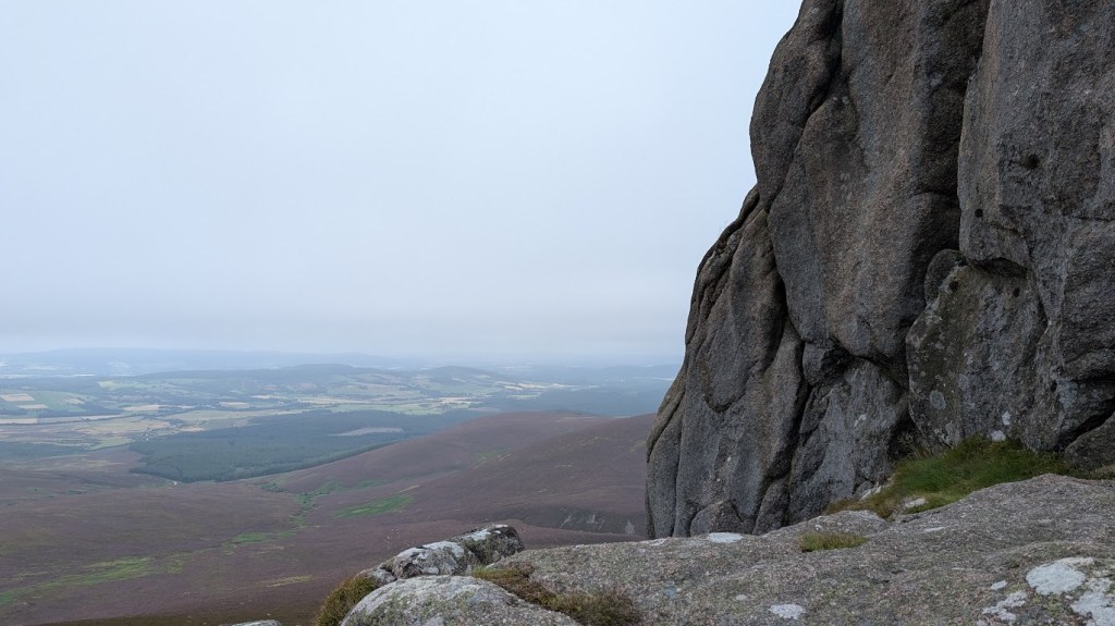 At the top with the rocky outcrop on the right and views on the left