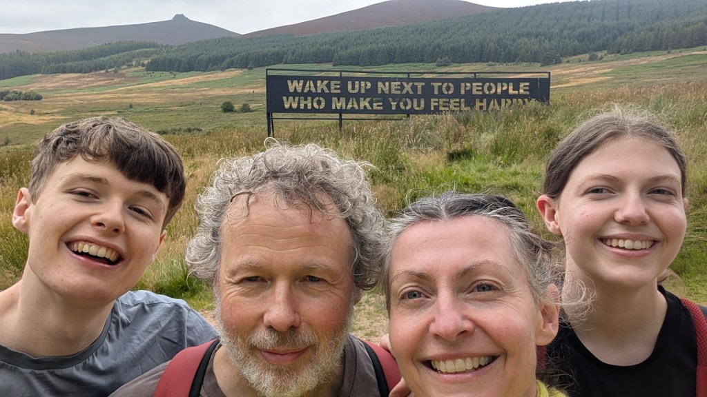 A selfie of the four of us with Clachnaben in the background.