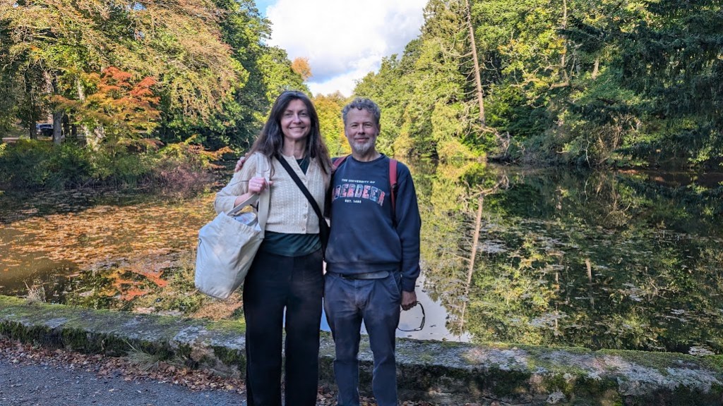 Rachel and Ben in front of the lake