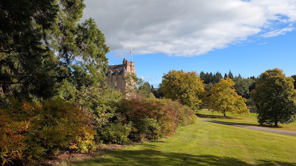 Crathes Castle visible between the trees