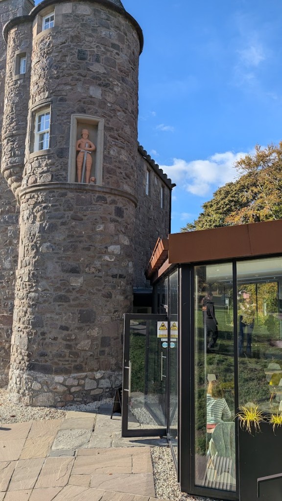 The knight in the tower and a small dog. 